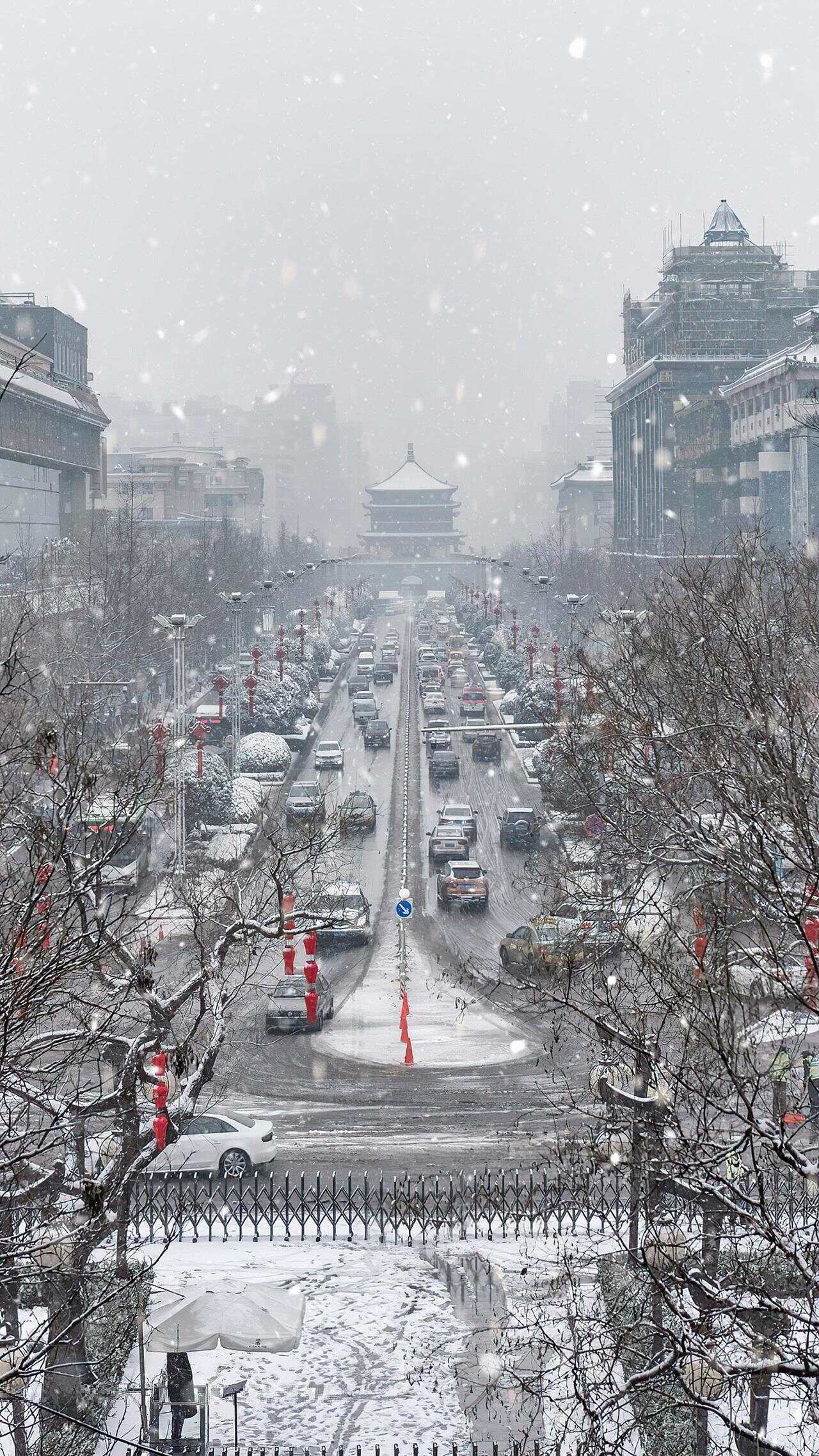 古都西安雪落纷飞，冬日韵味尽显魅力